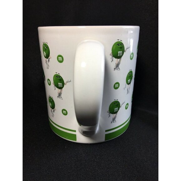 Green M&M Many Faces 16oz Ceramic White Coffee Tea Mug Cup Mars 2018 Sexy Lady - Picture 4 of 6